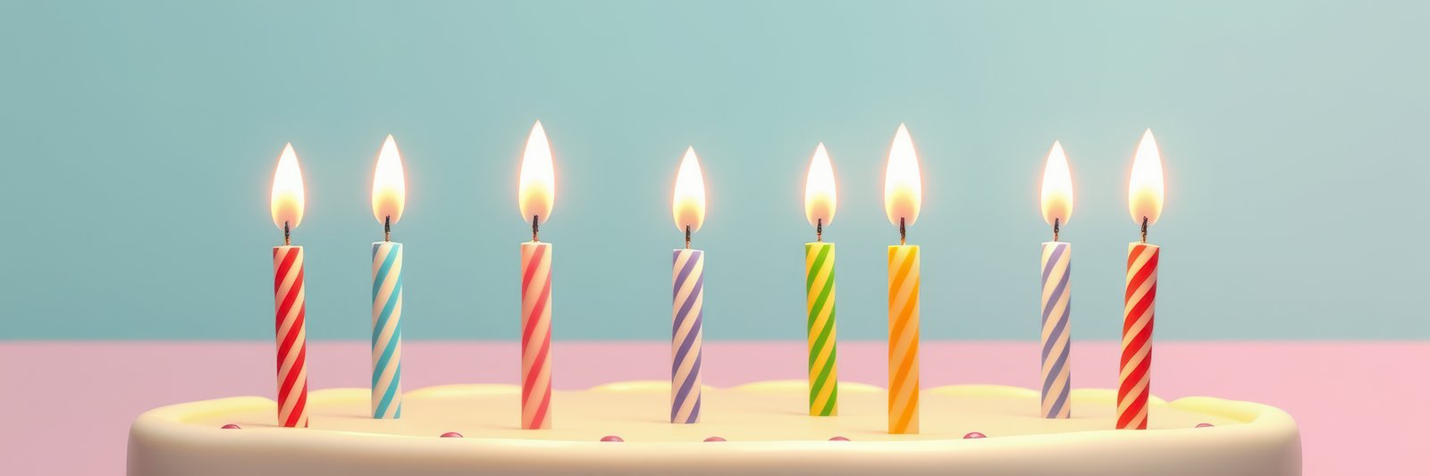 Colorful birthday cake with lit candles in a festive setting during a celebration